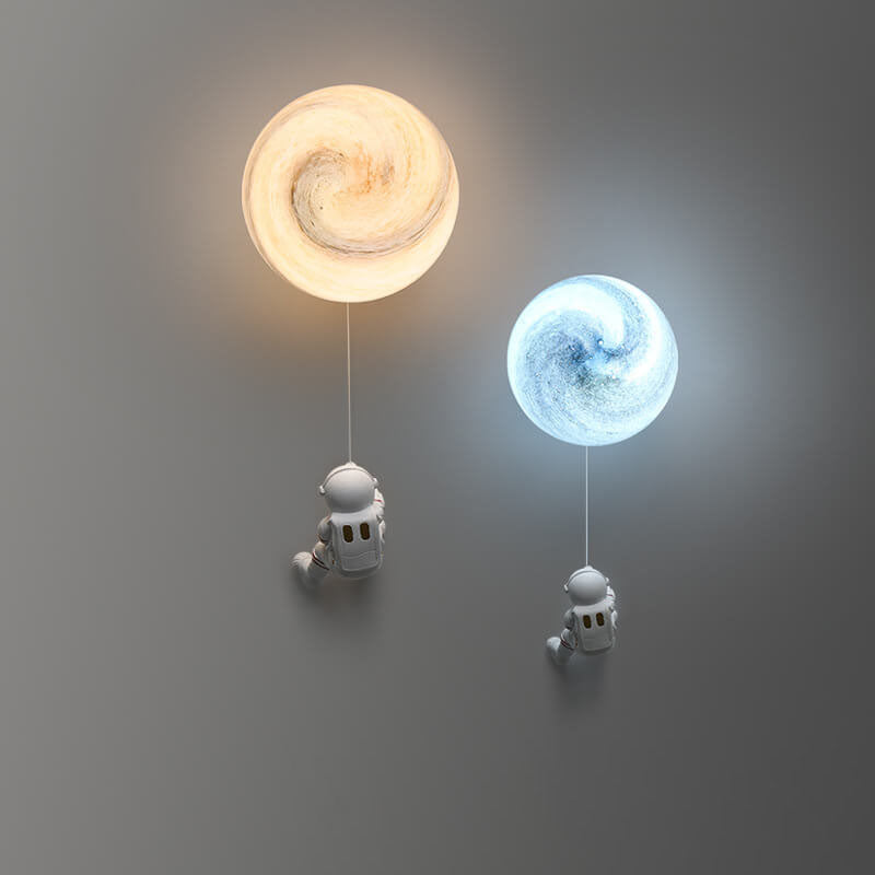 Contemporary Creative Orb Astronaut Iron Resin Wall Sconce