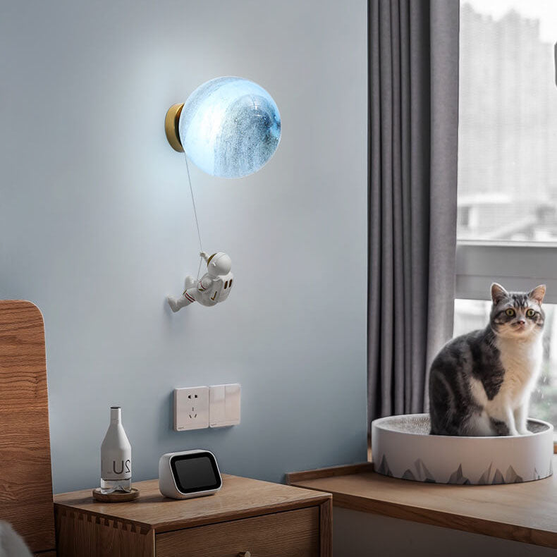 Contemporary Creative Orb Astronaut Iron Resin Wall Sconce